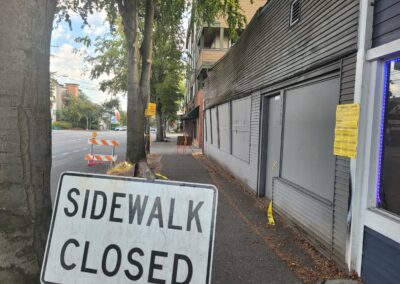 Emergency order closes sidewalk in front of vacant Greenwood building