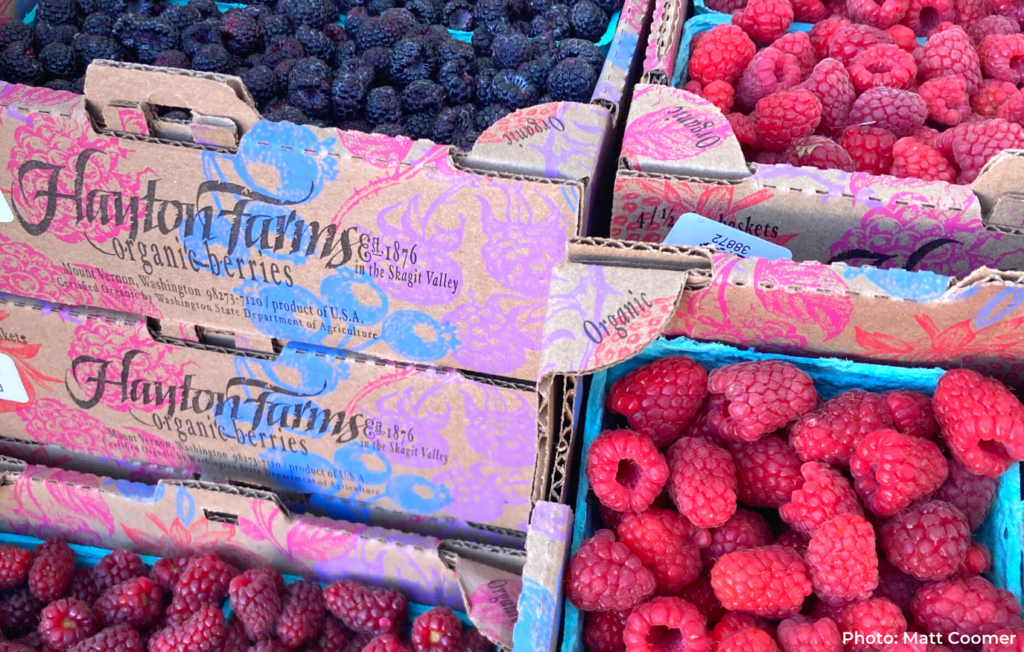 Flats of rasberries, blackberries, and more by Hayton Farms at Phinney Farmers Market.
