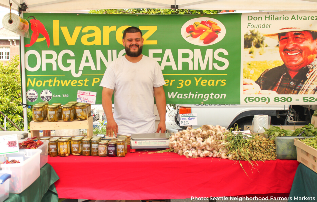 Alvarez Organic Farms booth with produce at the Phinney Farmers Market.