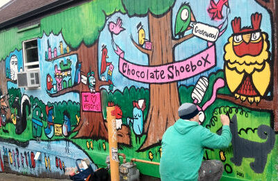 Finishing touches on Chocolate Shoebox mural